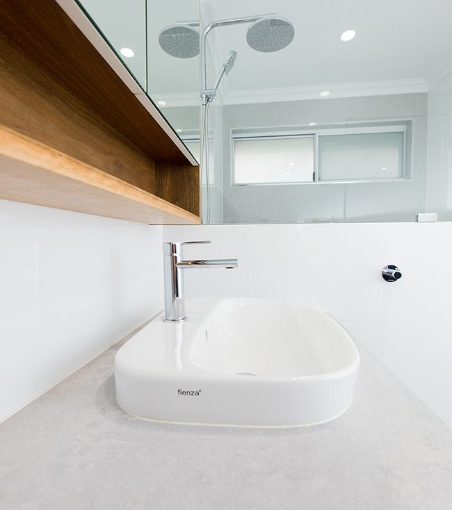 Bathroom sink on a vanity renovated by WA Assett