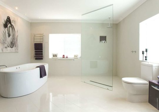 large accessible bathroom with bath