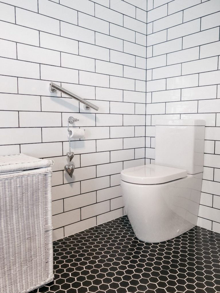 accessible bathroom white with tiles