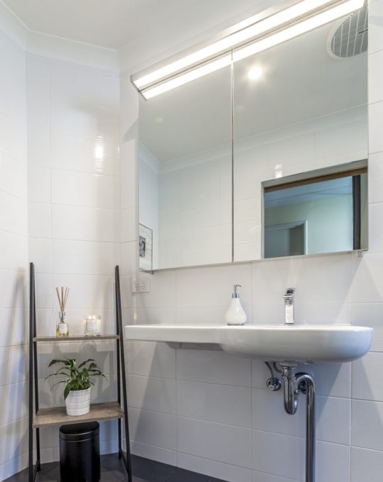 accessible bathroom in perth with large sink and mirrors