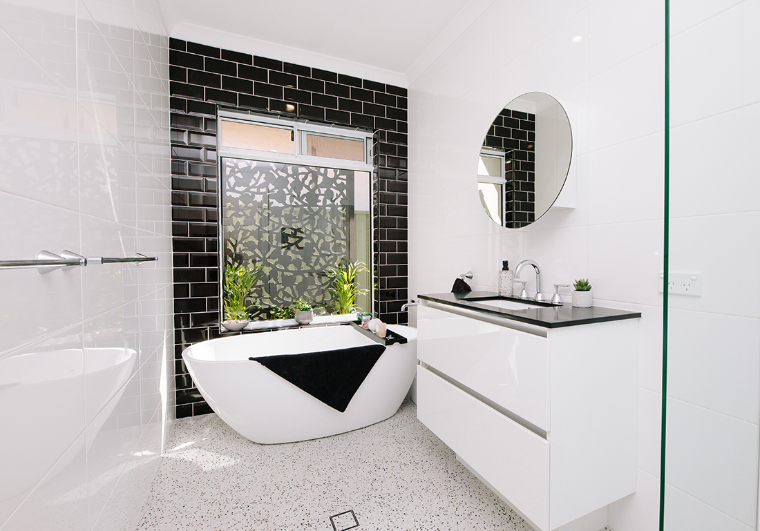 modern black and white tiled bathroom small
