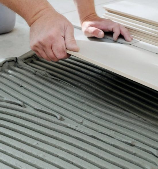 laying bathroom tiles