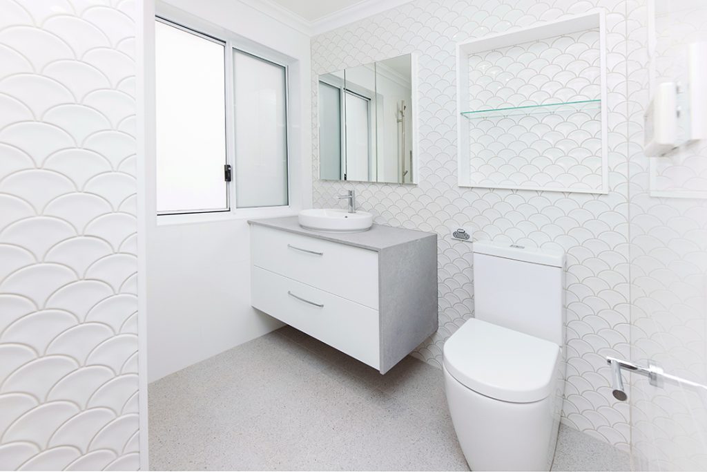 Bathroom vanity and toilet in a renovated WA Assett bathroom