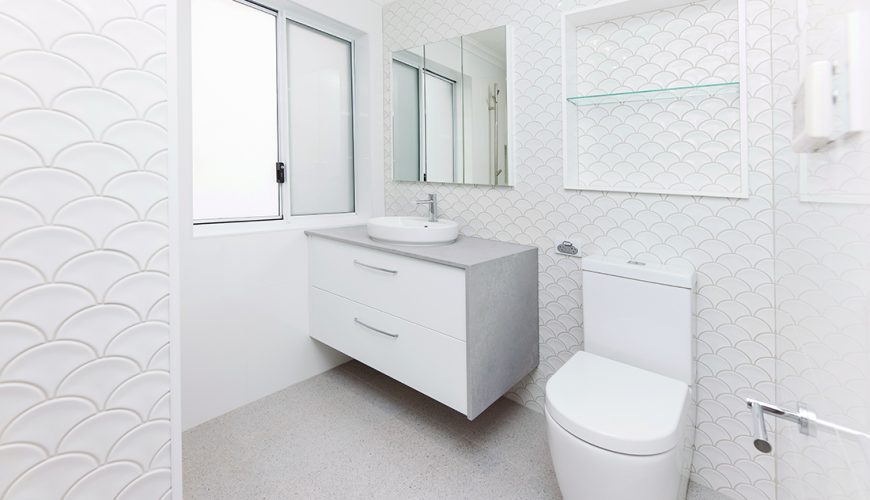 Bathroom vanity and toilet in a renovated WA Assett bathroom