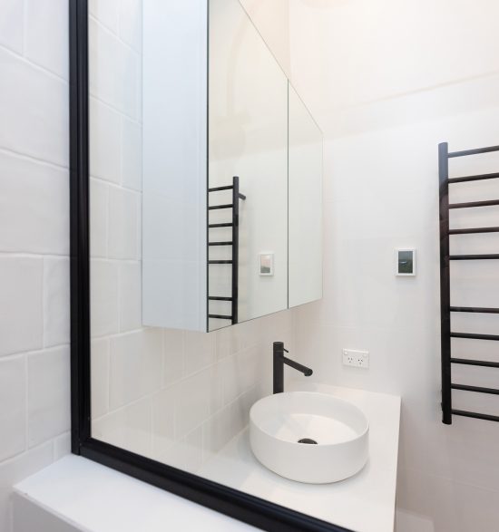 WA Assett Wembley 019 Bathroom renovation, mirror in a bathroom with a black frame.