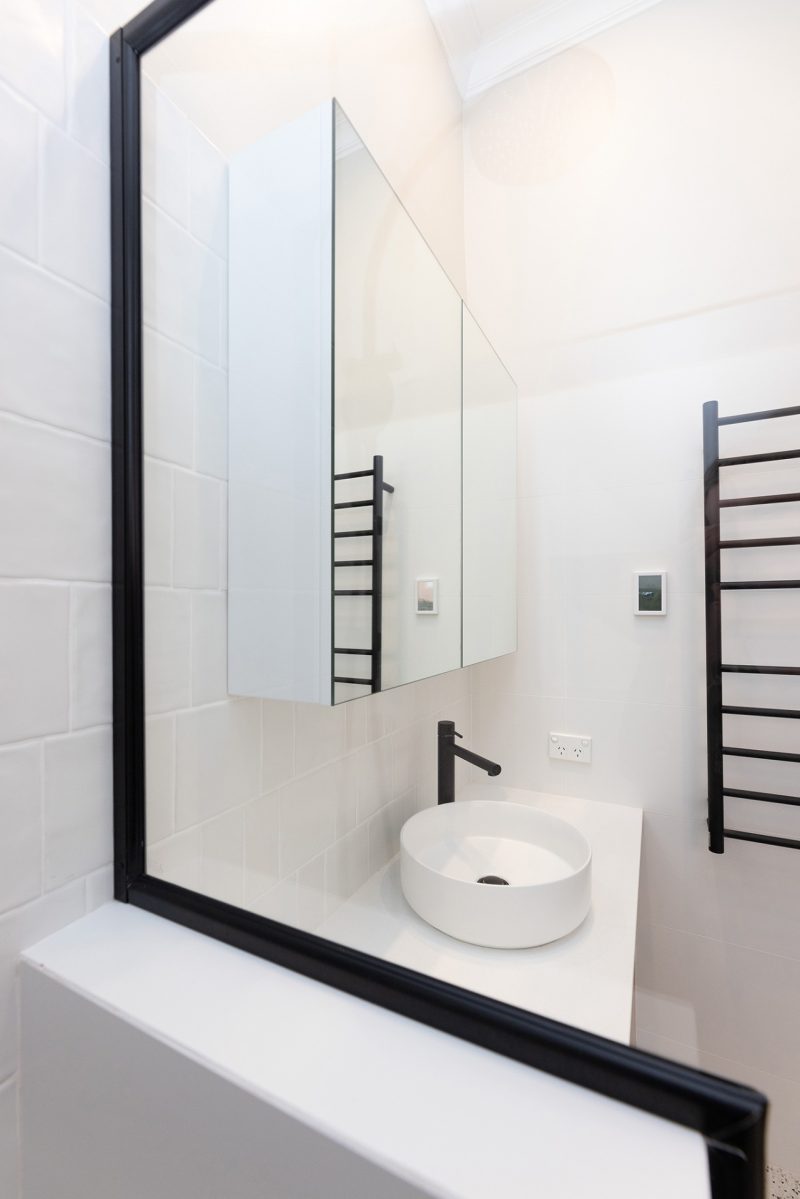 WA Assett Wembley 019 Bathroom renovation, mirror in a bathroom with a black frame.