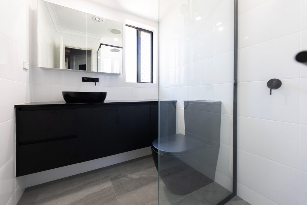 A monochrome bathroom renovated by WA Assett