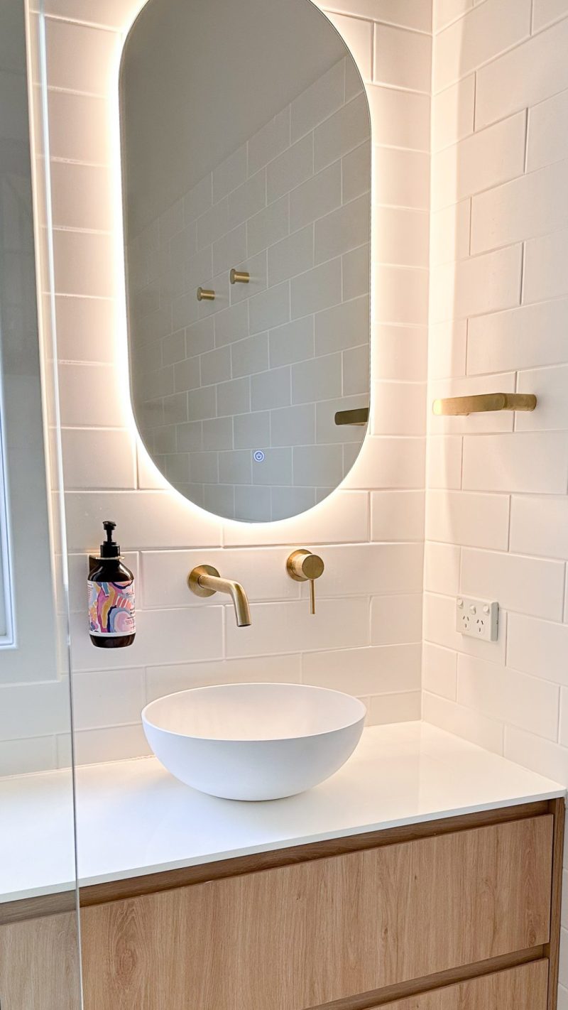 Nedlands CARRATHURS - 68 bathroom renovation, illuminated mirror and white basin.