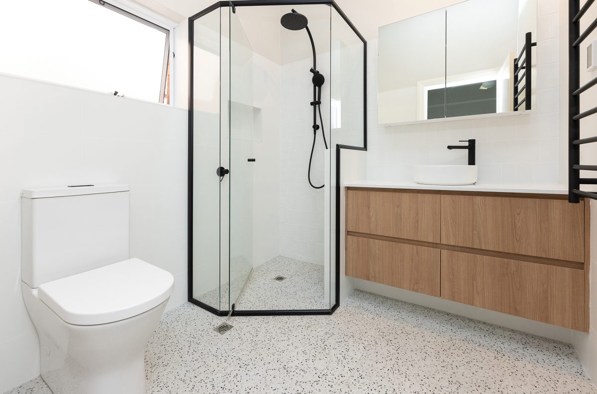 WA Asset Wembley- 008 bathroom renovation, black shower head and white toilet.