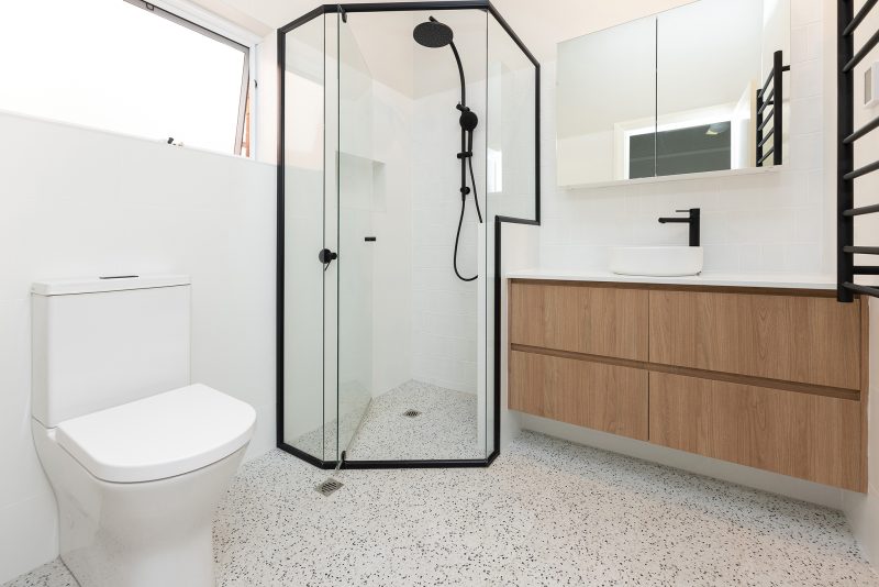 WA Asset Wembley- 008 bathroom renovation, black shower head and white toilet.